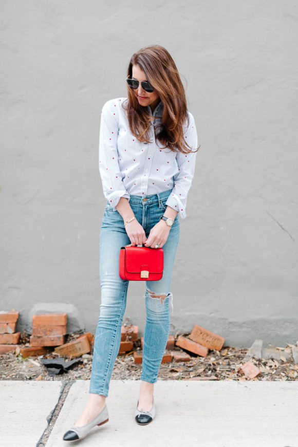 Amy Havins wears jeans and a button down.