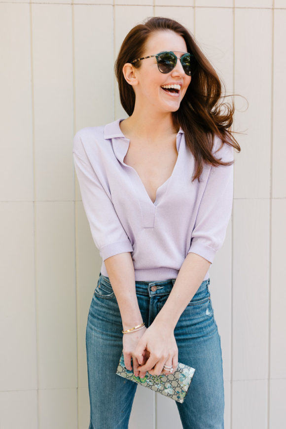 Amy Havins wears a purple tiki top and jeans.