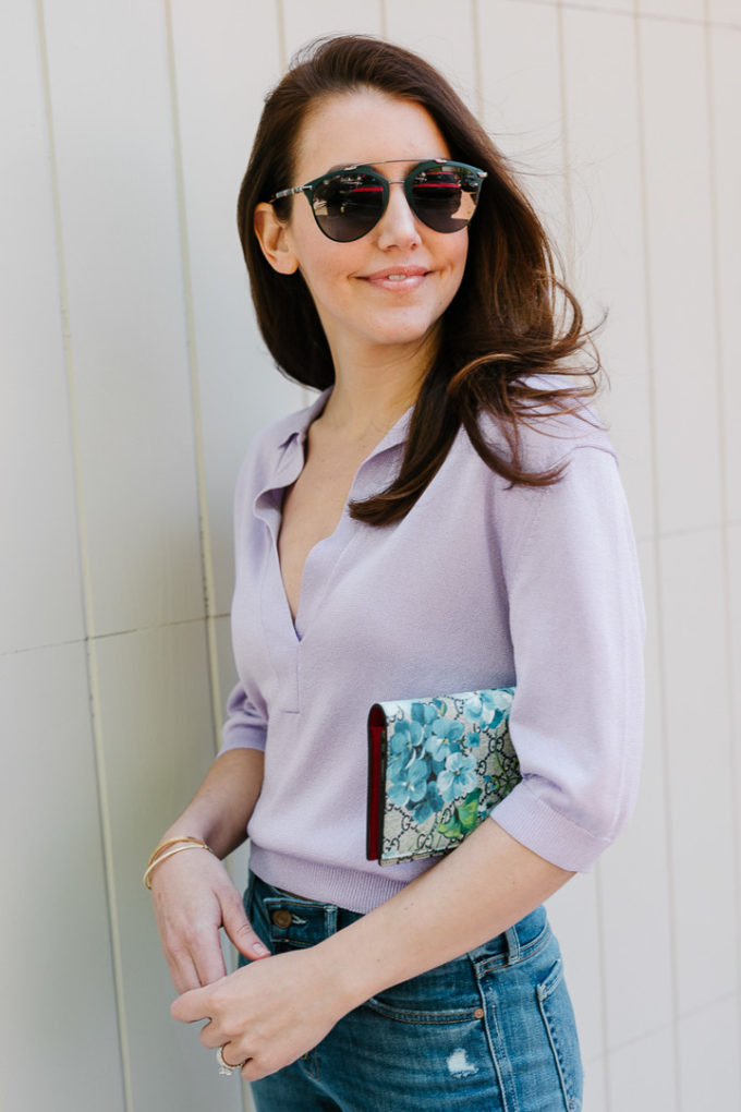 Amy Havins wears a purple tiki top and jeans.