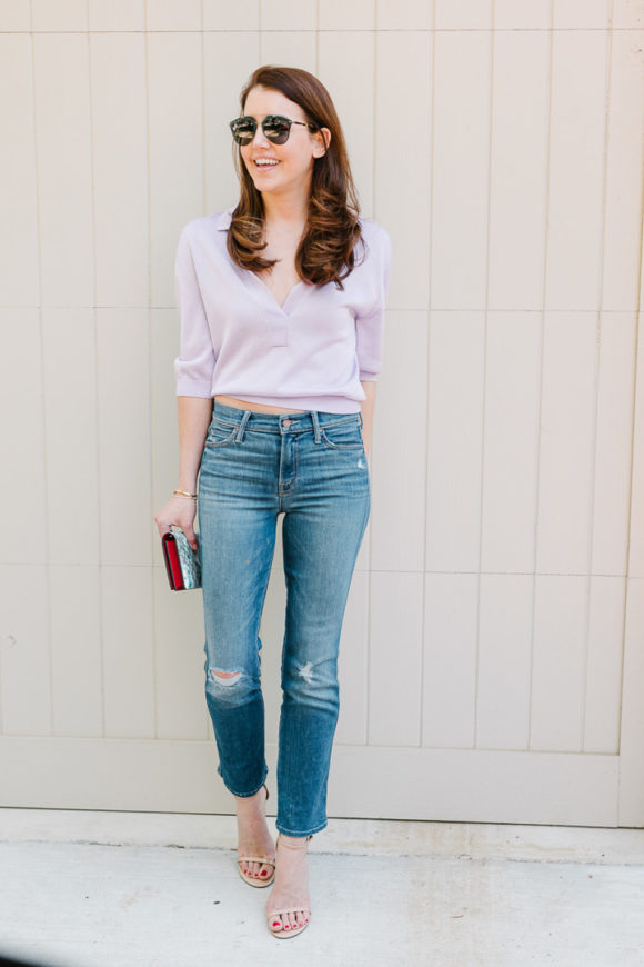 Amy Havins wears a purple tiki top and jeans.