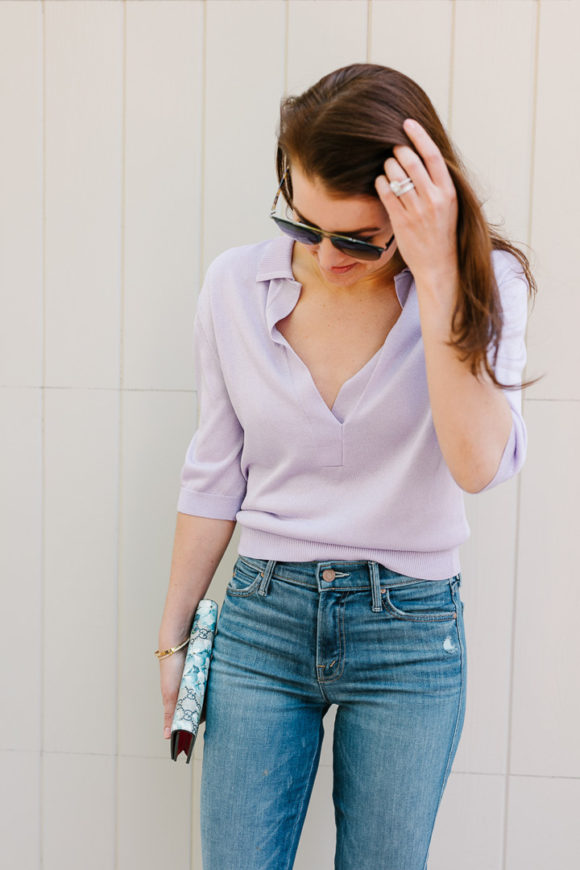 Amy Havins wears a purple tiki top and jeans.