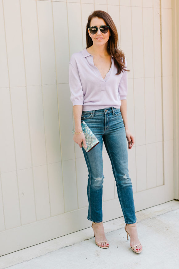 Amy Havins wears a purple tiki top and jeans.