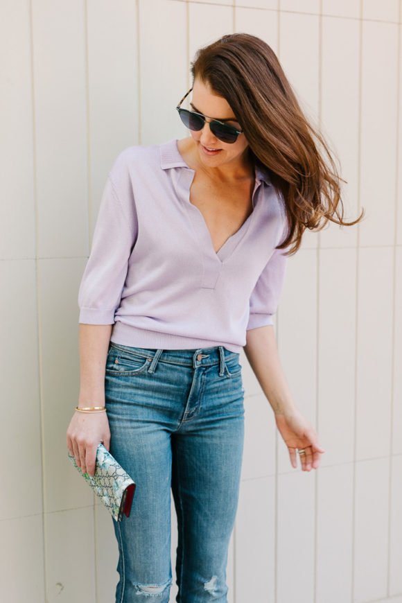 Amy Havins wears a purple tiki top and jeans.