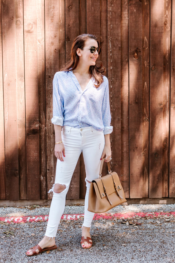 Amy Havins wears white jeans and a floral frank and eileen button down.