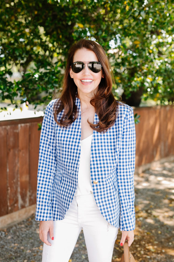 amy havins wears a gingham blazer.