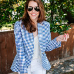 amy havins wears a gingham blazer.