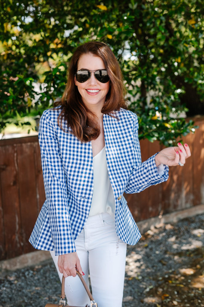 amy havins wears a gingham blazer.