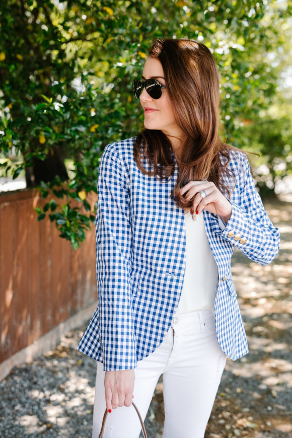 amy havins wears a gingham blazer.