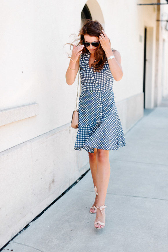 Amy Havins wears a gingham dress.