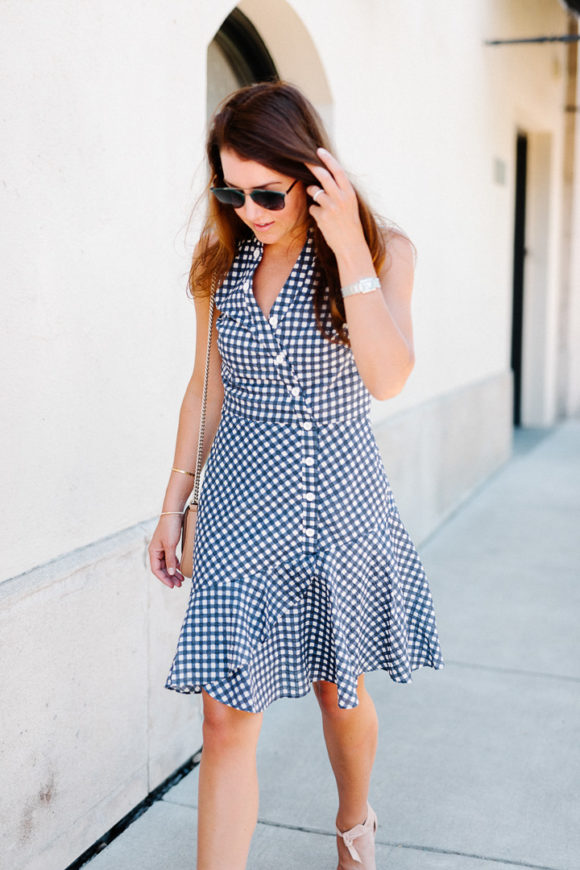 Amy Havins wears a gingham dress.