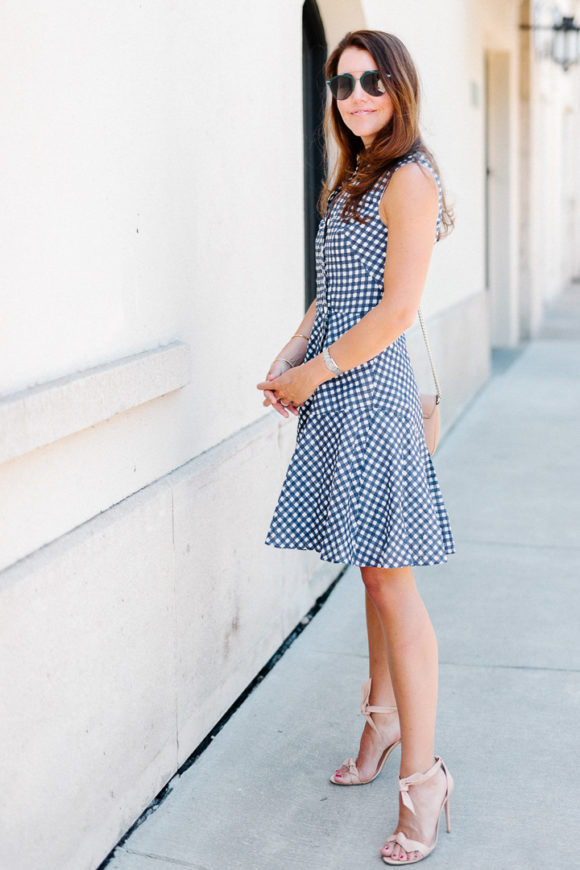 Amy Havins wears a gingham dress.