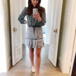 Amy Havins wears a casual dress and nude flats