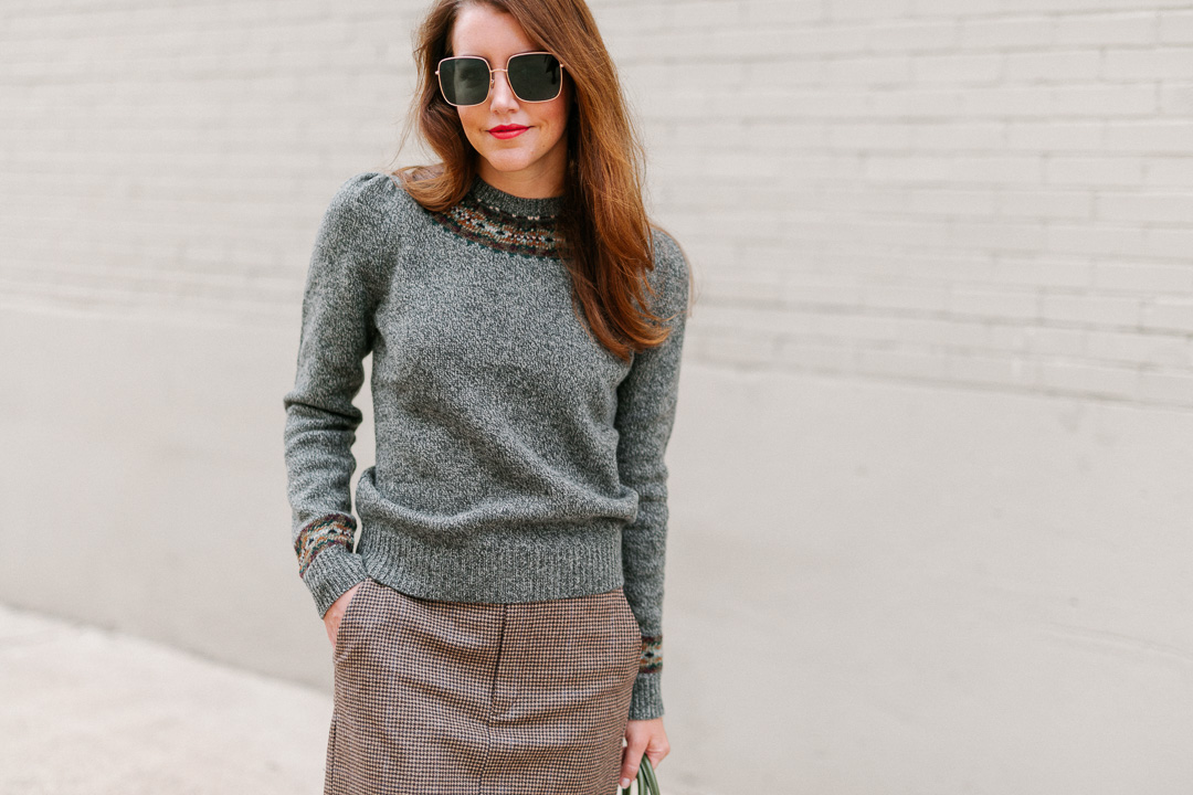 Amy Havins wears a Ralph Lauren Skirt and sweater combination.