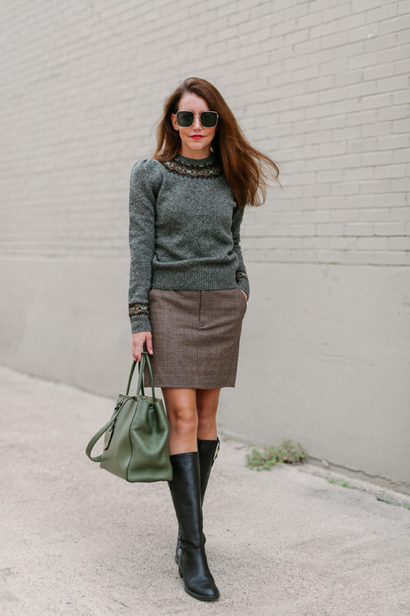 Amy Havins wears a Ralph Lauren Skirt and sweater combination.