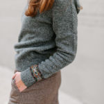 Amy Havins wears a Ralph Lauren Skirt and sweater combination.