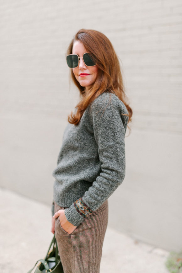 Amy Havins wears a Ralph Lauren Skirt and sweater combination.