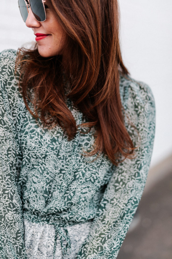 Amy Havins wears a Veronica Beard printed dress.