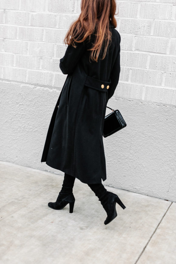 Amy Havins wears a black ralph lauren coat.