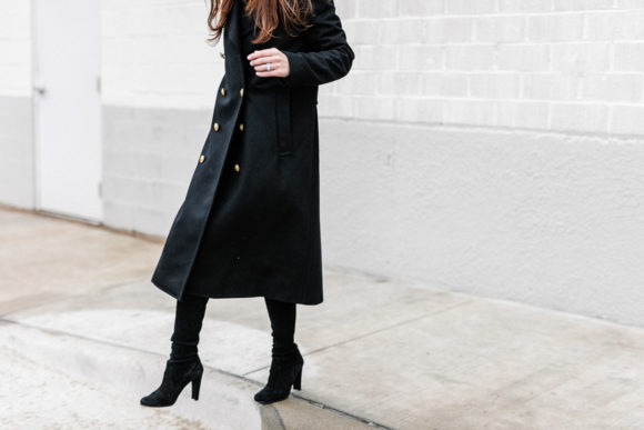 Amy Havins wears a black ralph lauren coat.