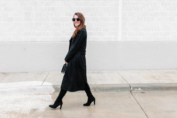 Amy Havins wears a black ralph lauren coat.