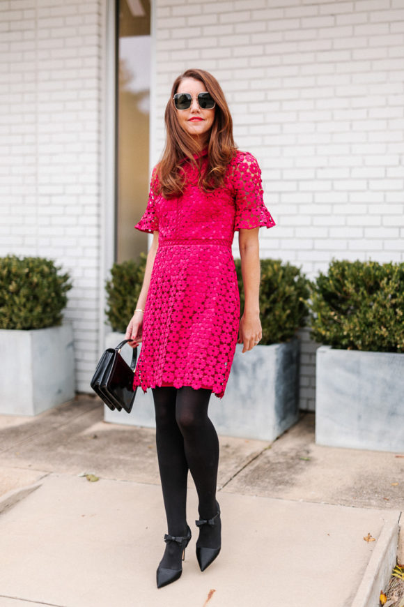 Amy havins wears a pink mini shoshanna dress.