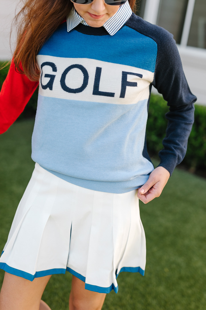 Amy Havins wears Tory Sport Golf Attire.