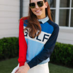 Amy Havins wears Tory Sport Golf Attire.